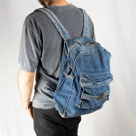 mochila mezclilla wrangler